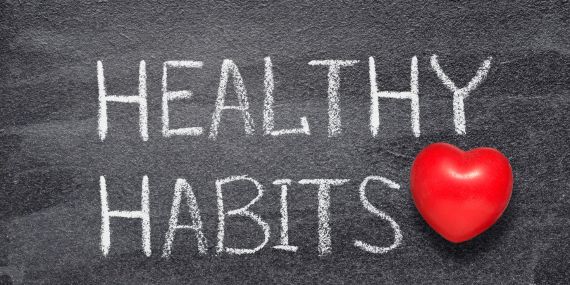 5 Healthy Habits You Can Stick With in 2022 - a sign saying healthy habits