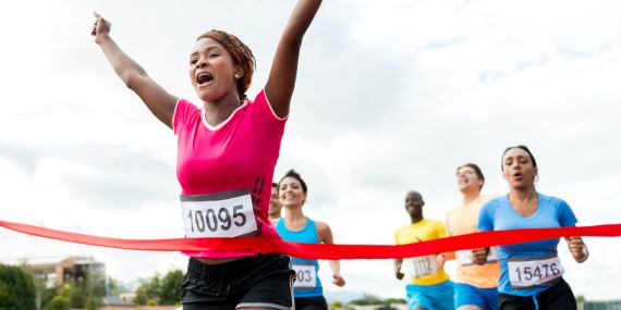 How To Develop Self-Accountability Now - woman finishing a race