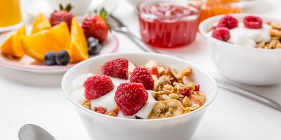 breakfast bowl of cereal and fruits -  6 Essential Ways To Boost Your Midlife Wellness