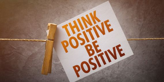  sign saying think positive be positive - 6 Essential Ways To Boost Your Midlife Wellness