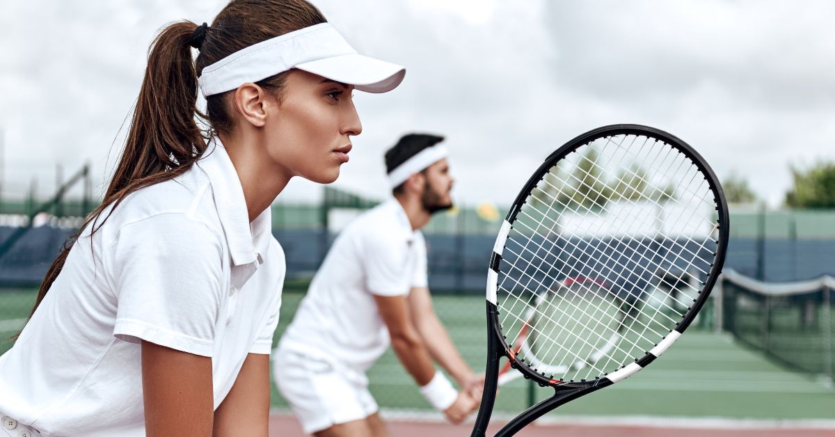 Moving Beyond the All-or-Nothing Wellness Mindset - woman playing tennis 