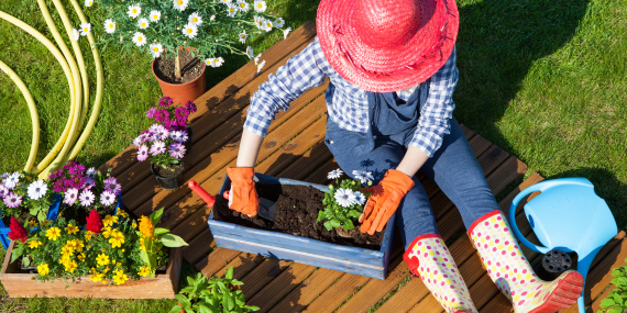 Moving Beyond the All-or-Nothing Wellness Mindset - woman sitting in garden gardening