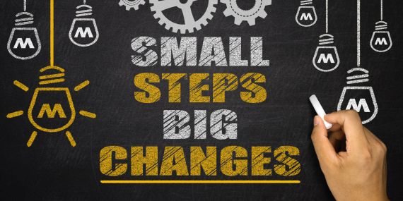 sign saying small steps big changes 