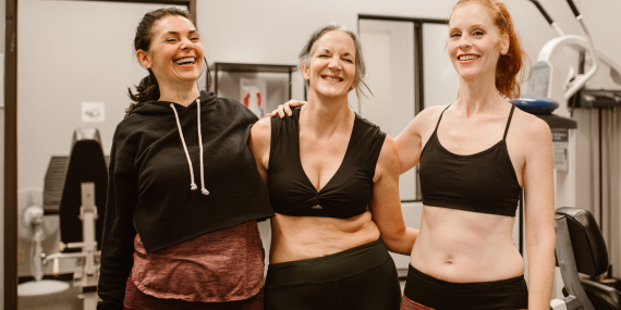 midlife women after a workout feeling strong with energy pursuing their midlife health goals