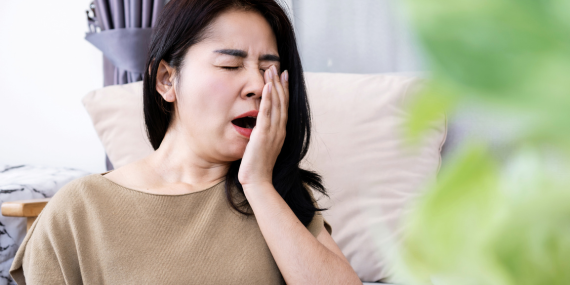 women jawing because of midlife fatigue 