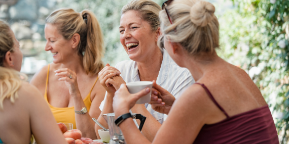 Midlmidlife women playing golfife woman enjoying a healthy eating reset after summer