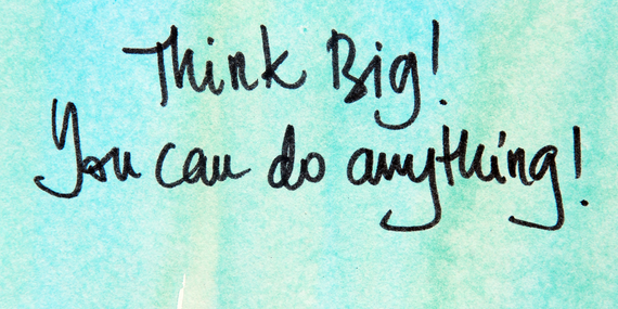 A sign saying: Think Big. You can to anything. for midlife consistency