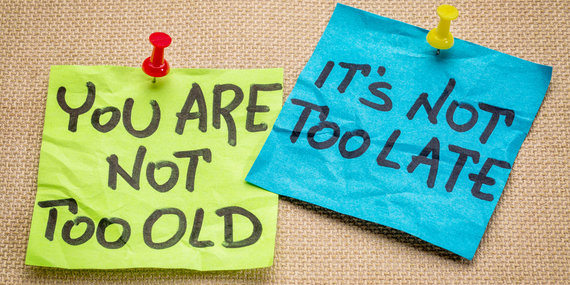 two sticky notes saying: Your are not too old and It's not too late