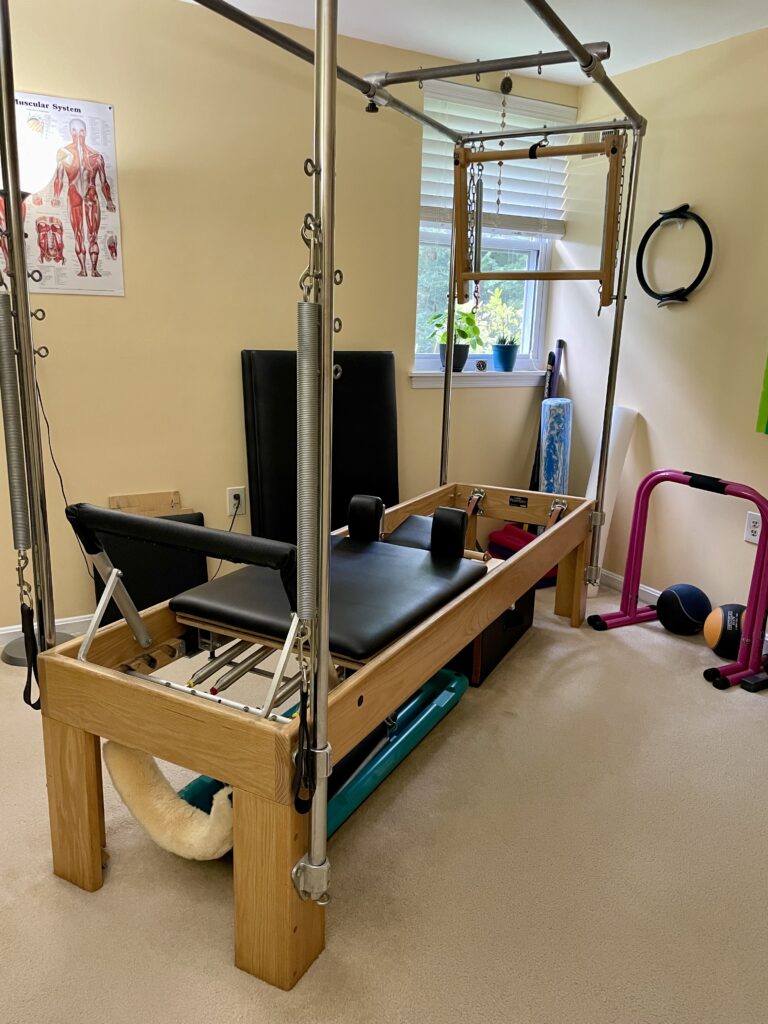 Pilates Reformer/ Cadillac therapeutic equipment for women and men in midlife. 